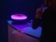 Audio Technica Hotaru turntable spins records on levitating platform, glows...