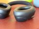 Close-up view of the JLab Epic Lux Lab Edition headphones, focusing on the ear cups and touch control area.