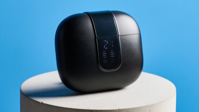 the h2o audio ript-lite earbuds in black and blue, photographed against a blue background, for both working out and everyday use