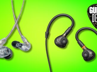 Two pairs of Shure and Beyerdynamic in-ear monitors on a green background