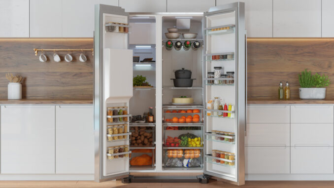 An open refrigerator stocked with food