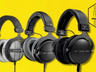 Three pairs of Beyerdynamic studio headphones on a yellow textured background