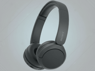 A pair of dark gray Sony over-ear headphones with a red accent on the left earcup, presented on a professional flat design background with subtle light gray patterns and gradients.